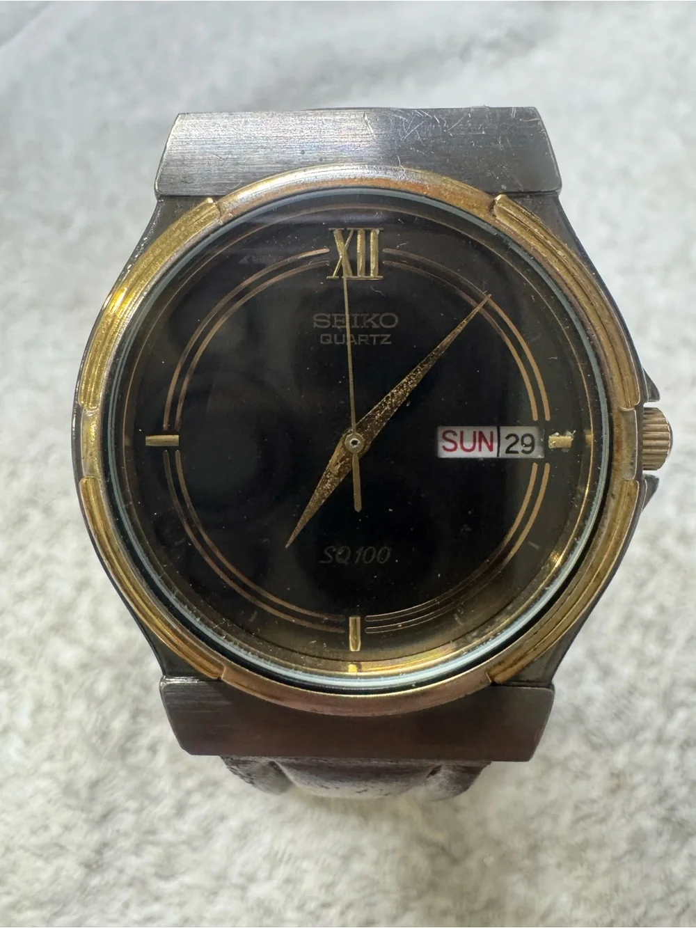 Seiko Black Dial Watch with Gold Accents